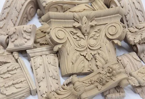 Резные декоративные элементы из дерева для интерьерной отделки, создающие элегантный и утончённый стиль