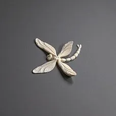 Шкаф с элегантными декоративными элементами из лепнины NPU-480 золотистого цвета, декор мебели в современном стиле.