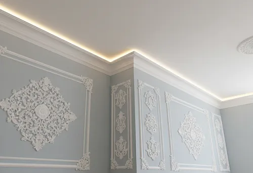 Интерьер с плинтусами и потолочными карнизами из полистирола и пенопласта в едином стиле оформления потолка и стен