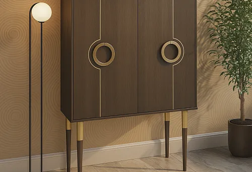 Элегантный шкаф в стиле модерн с темным деревом и золотыми ручками.
