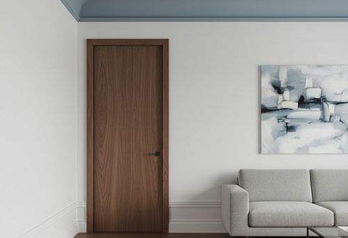 Интерьер с дюрополимерными карнизами и плинтусами, демонстрирующий прочность и аккуратный внешний вид декоративных элементов на стенах и потолке.